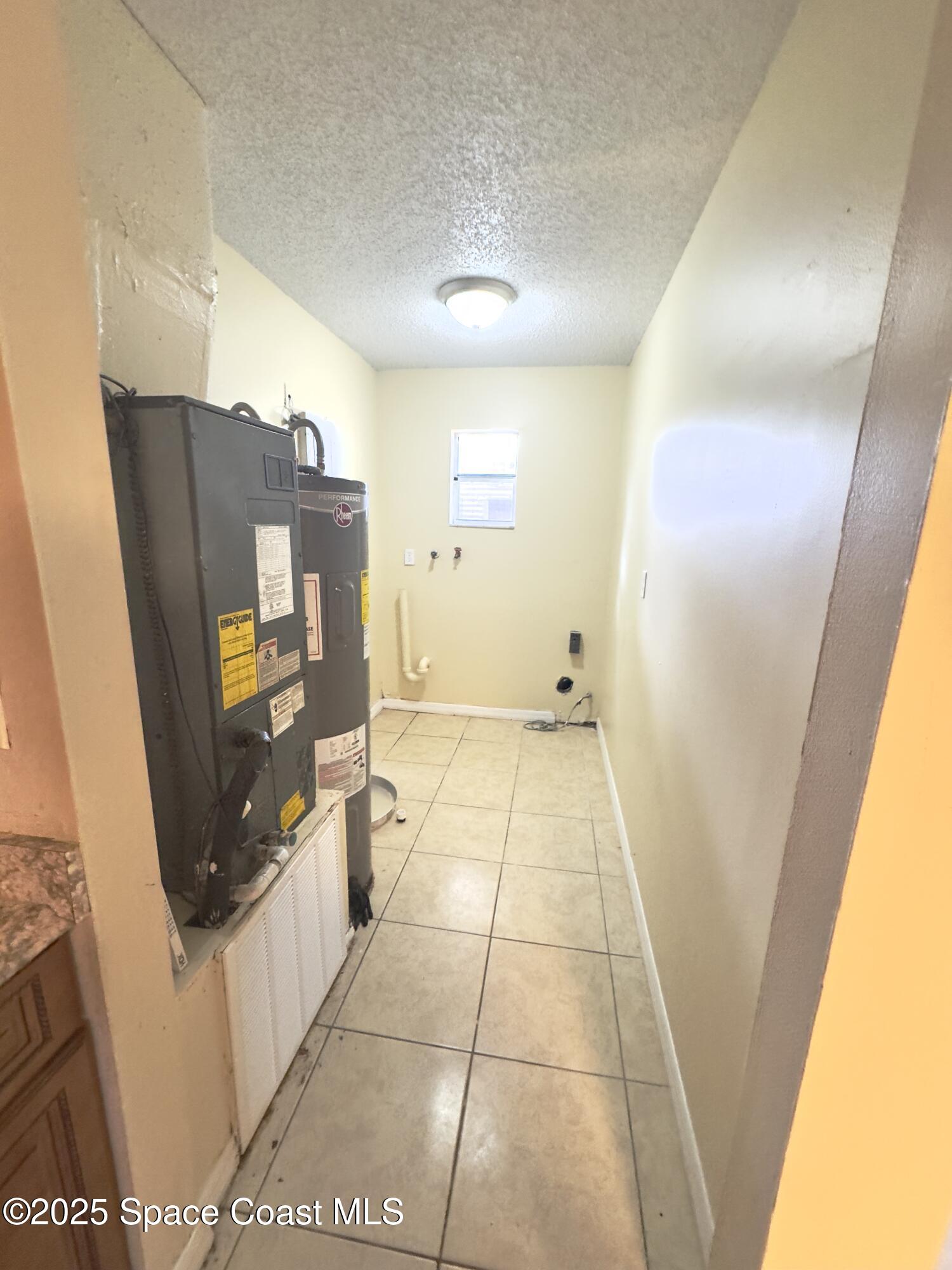 2466 Uranus Drive Cocoa, FL 32926 - Photo 15 of 20 a view of utility room