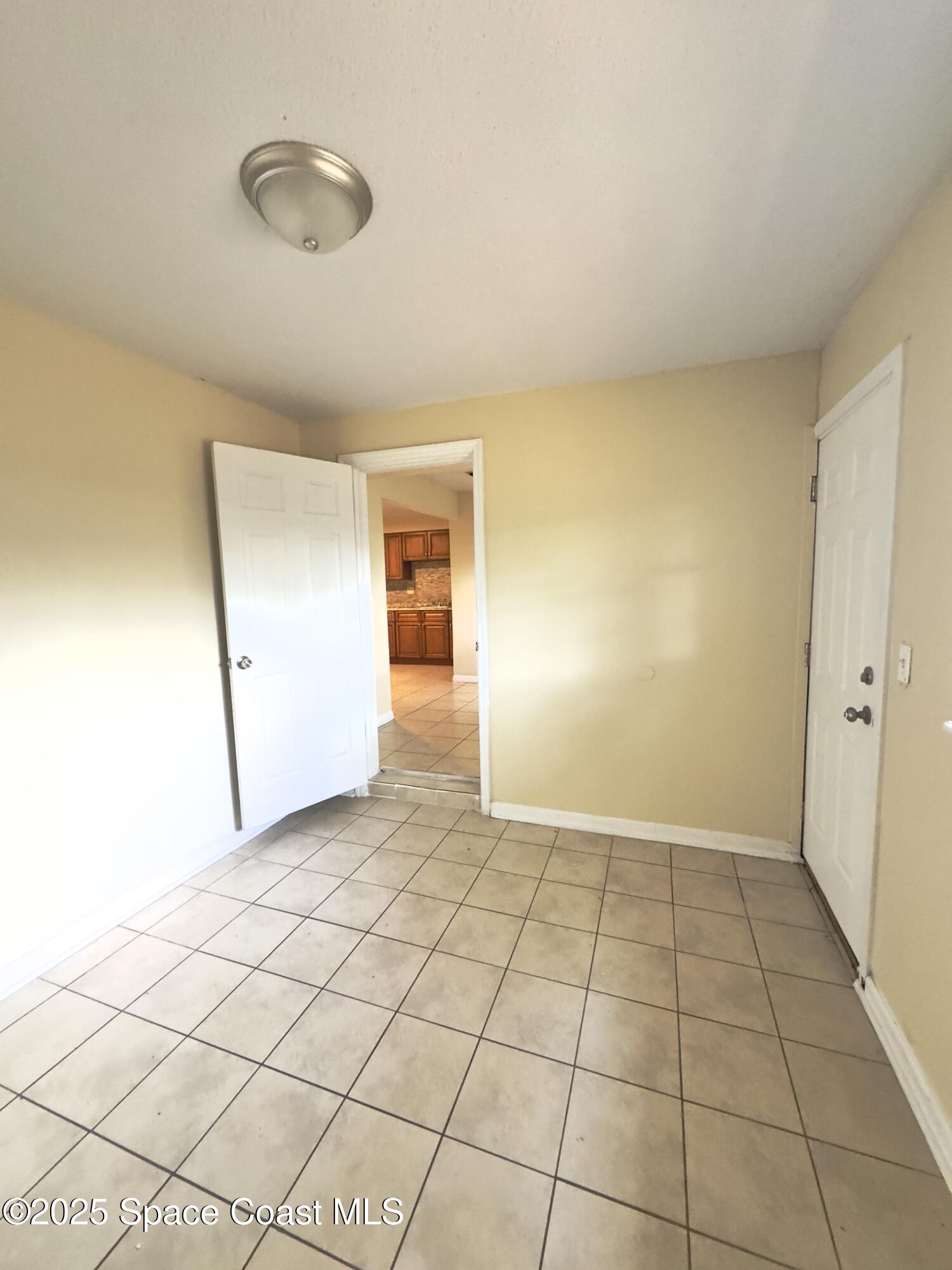 2466 Uranus Drive Cocoa, FL 32926 - Photo 18 of 20 a view of an empty room and window