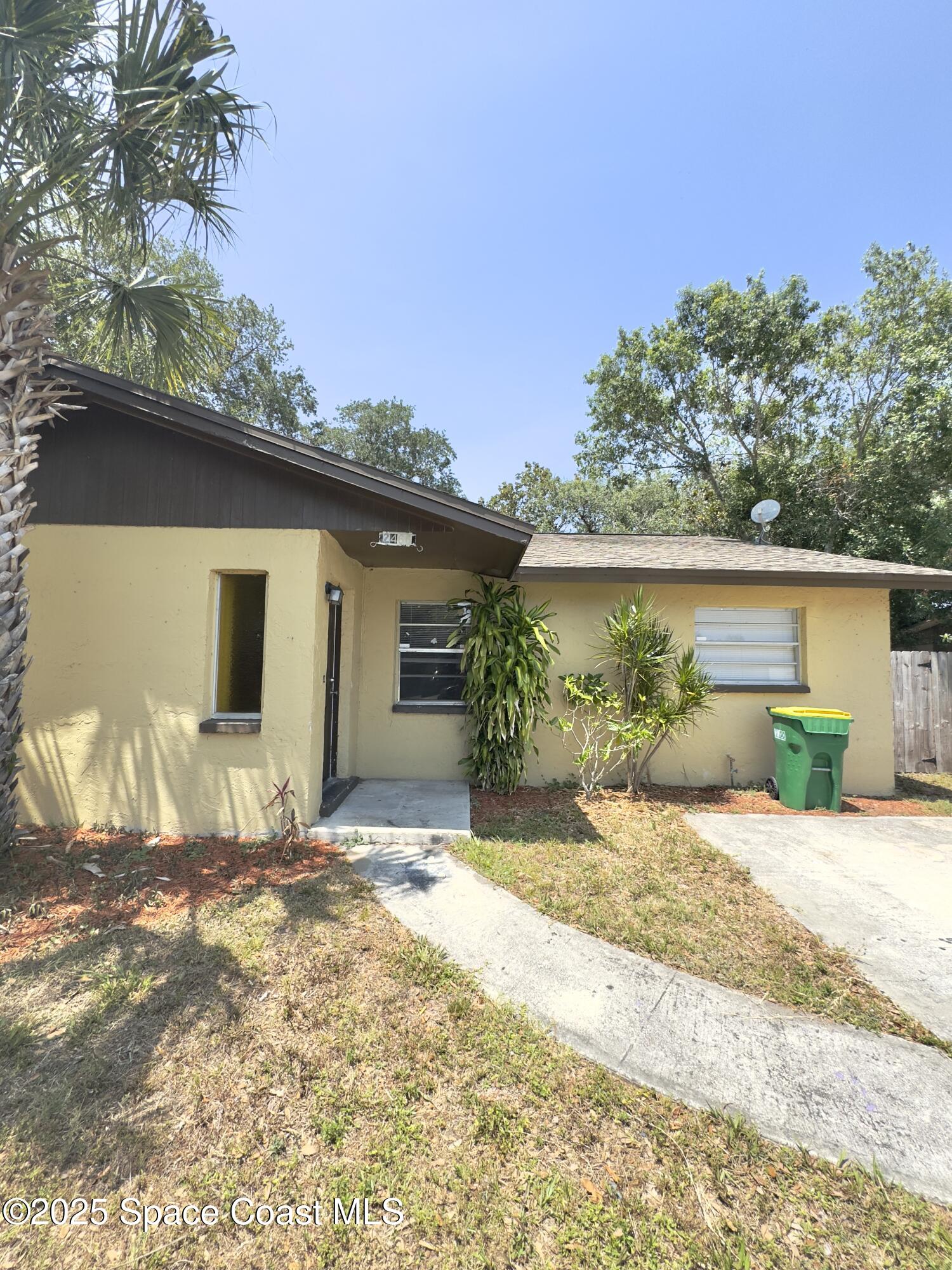 2466 Uranus Drive Cocoa, FL 32926 - Photo 3 of 20 a view of a house with a patio