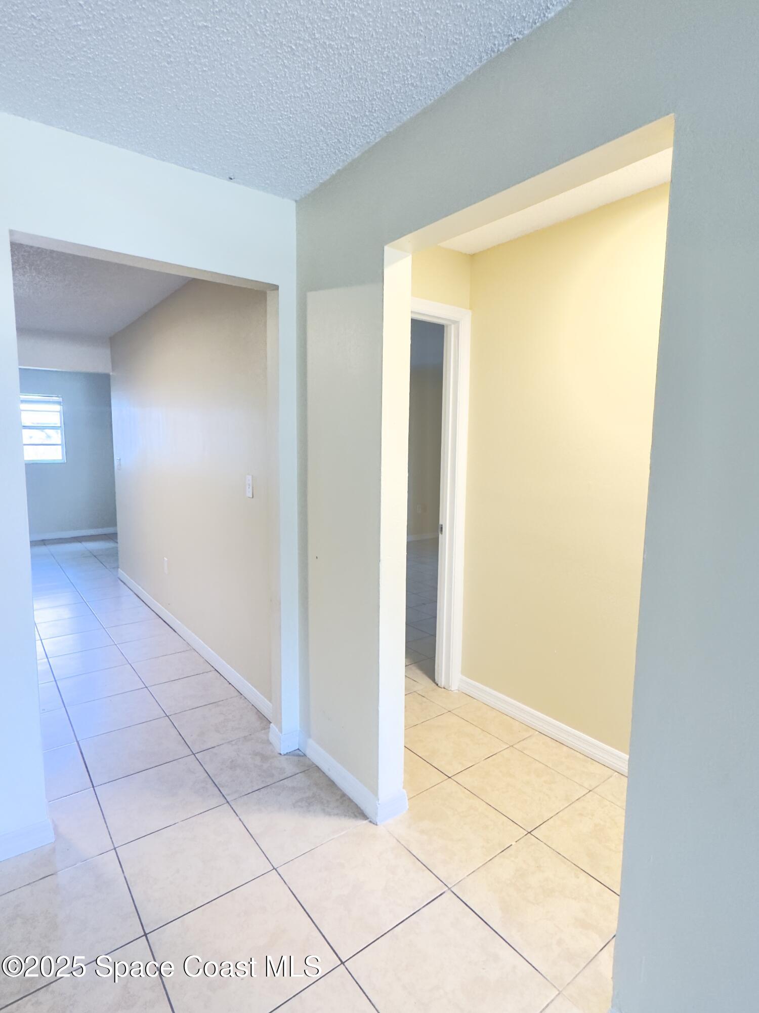 2466 Uranus Drive Cocoa, FL 32926 - Photo 6 of 20 a view of an empty room with closet and a window