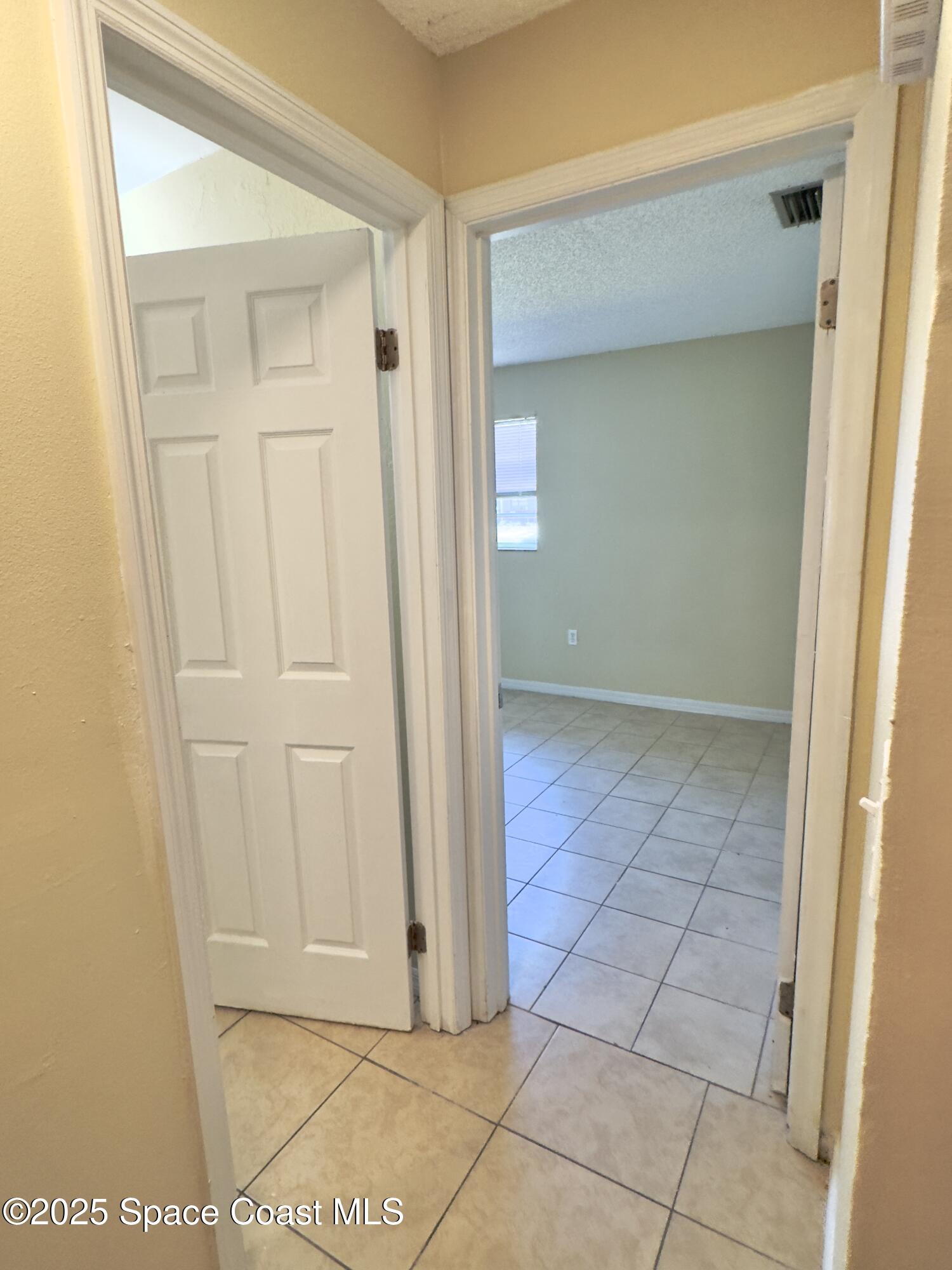 2466 Uranus Drive Cocoa, FL 32926 - Photo 7 of 20 a view of a hallway