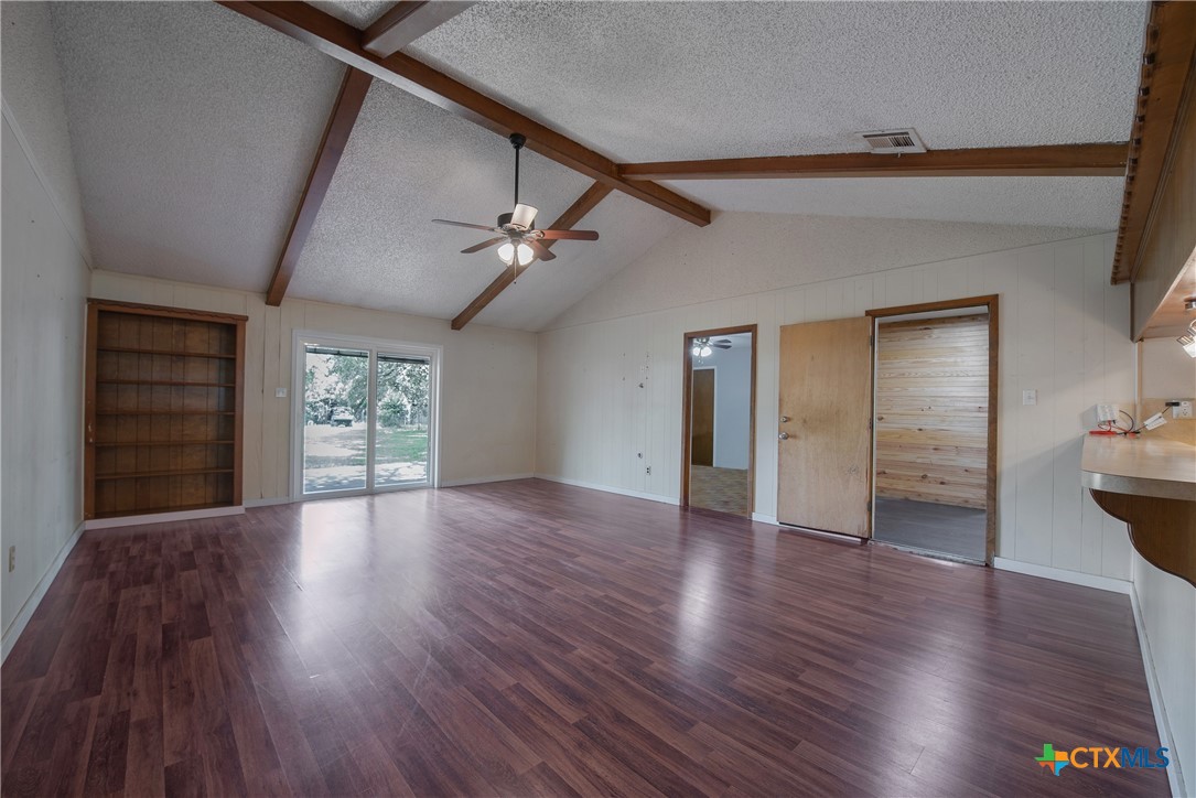 504 Walnut Street Waller, TX 77484 - Photo 5 of 35 Large Family Room with Cathedral Ceiling with Access to Backyard