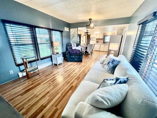 10819 London Drive Port Richey, FL 34668 - Photo 25 of 52 a living room with furniture