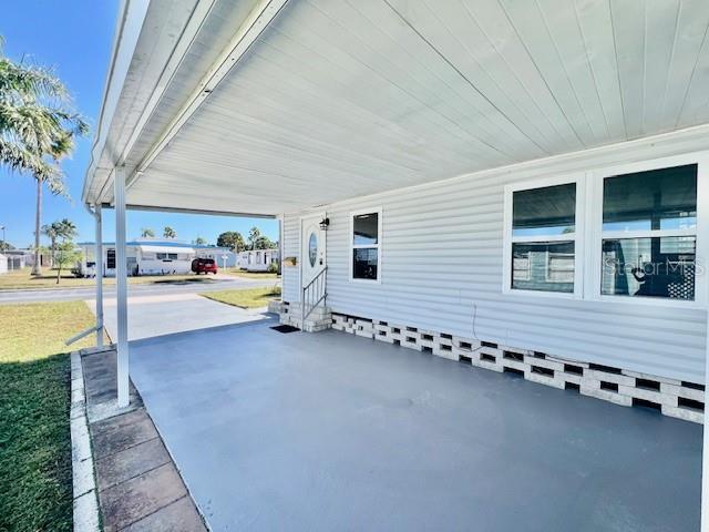 10819 London Drive Port Richey, FL 34668 - Photo 5 of 52 a view of swimming pool with outdoor seating