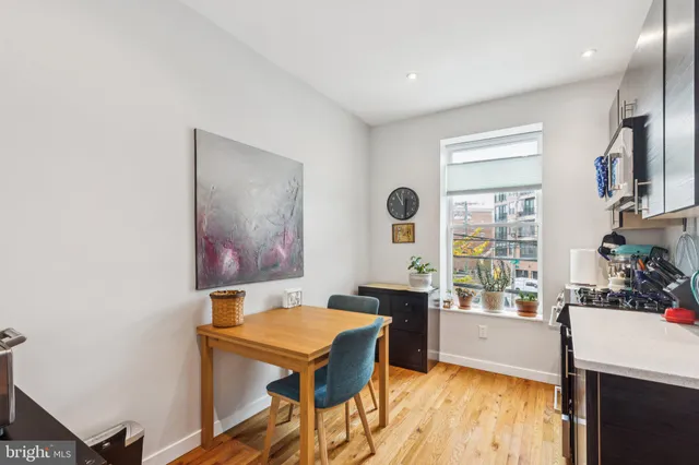 a view of a livingroom with furniture and window