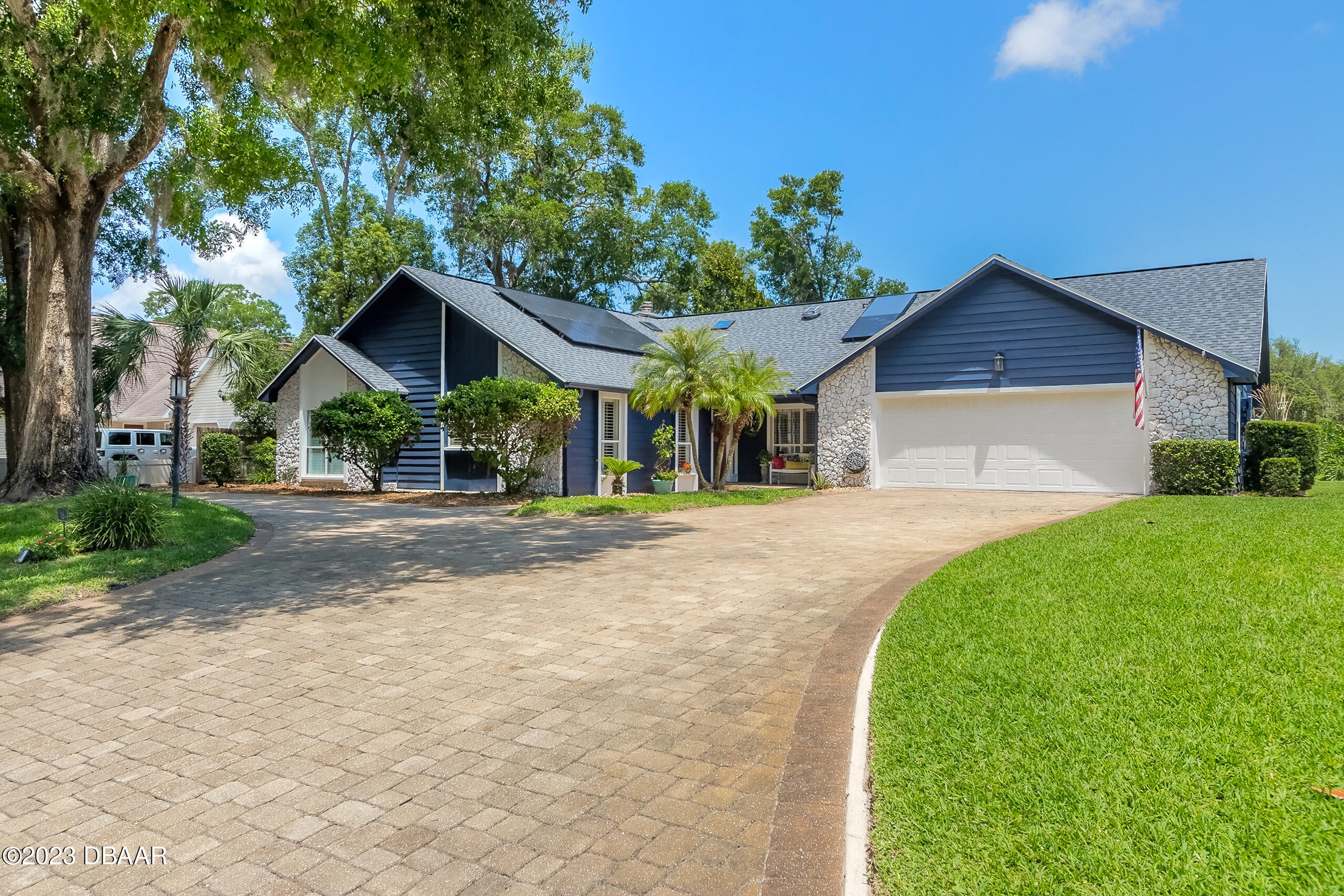 16 Eagle Court Ormond Beach, FL 32174 - Photo 1 of 50 a front view of a house with a yard