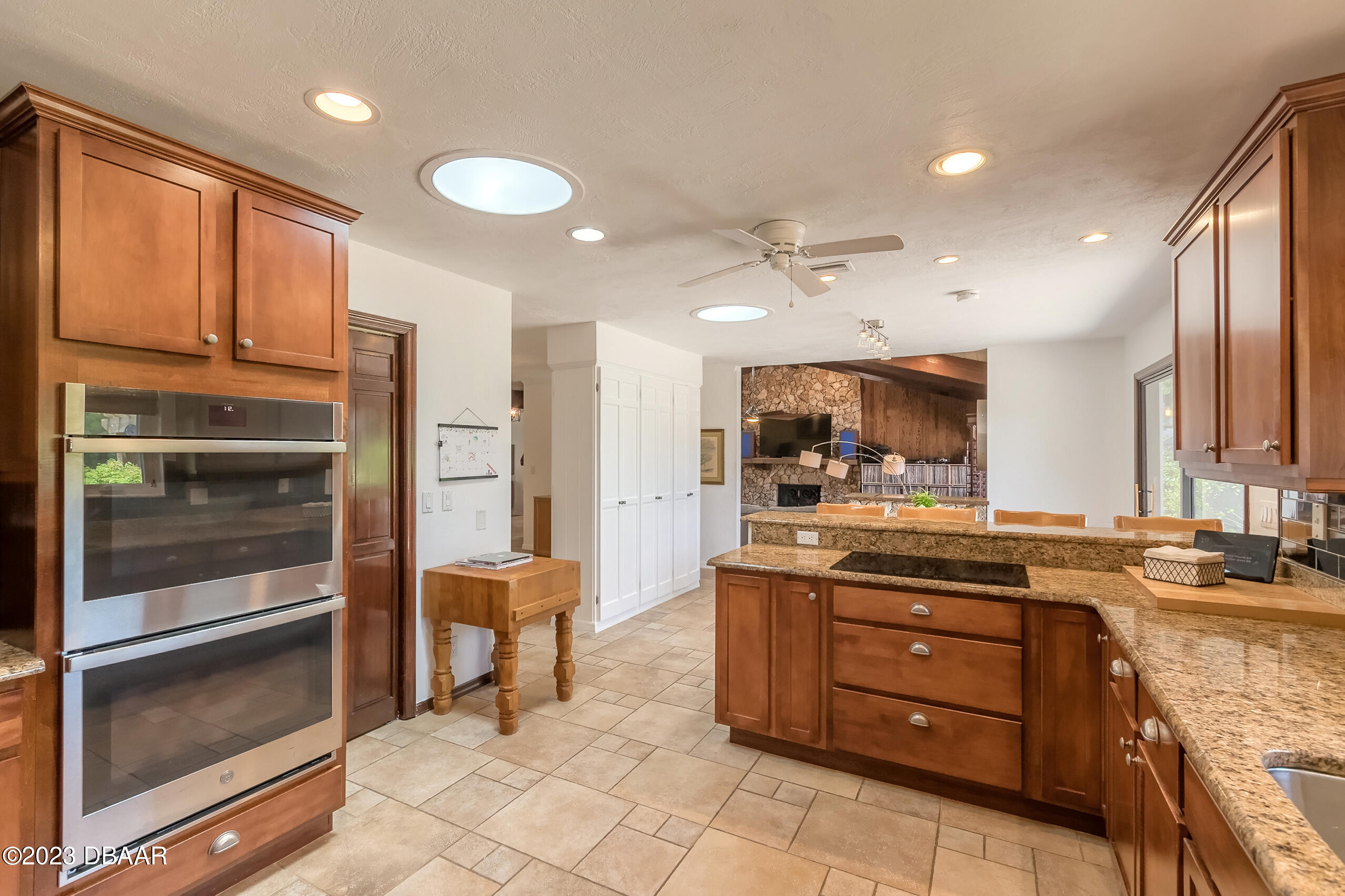 16 Eagle Court Ormond Beach, FL 32174 - Photo 17 of 50 a kitchen with a sink appliances and cabinets