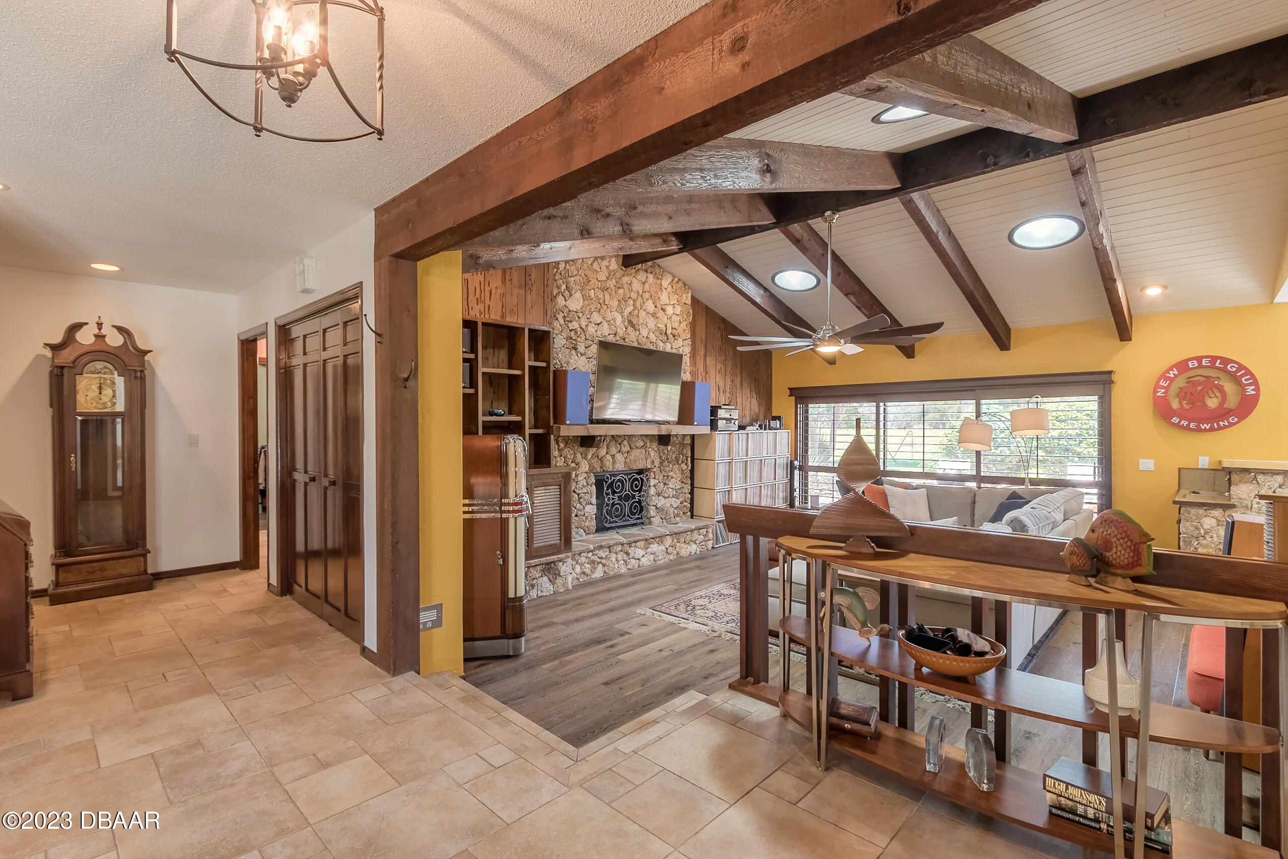 16 Eagle Court Ormond Beach, FL 32174 - Photo 21 of 50 a dining room with furniture and a floor to ceiling window