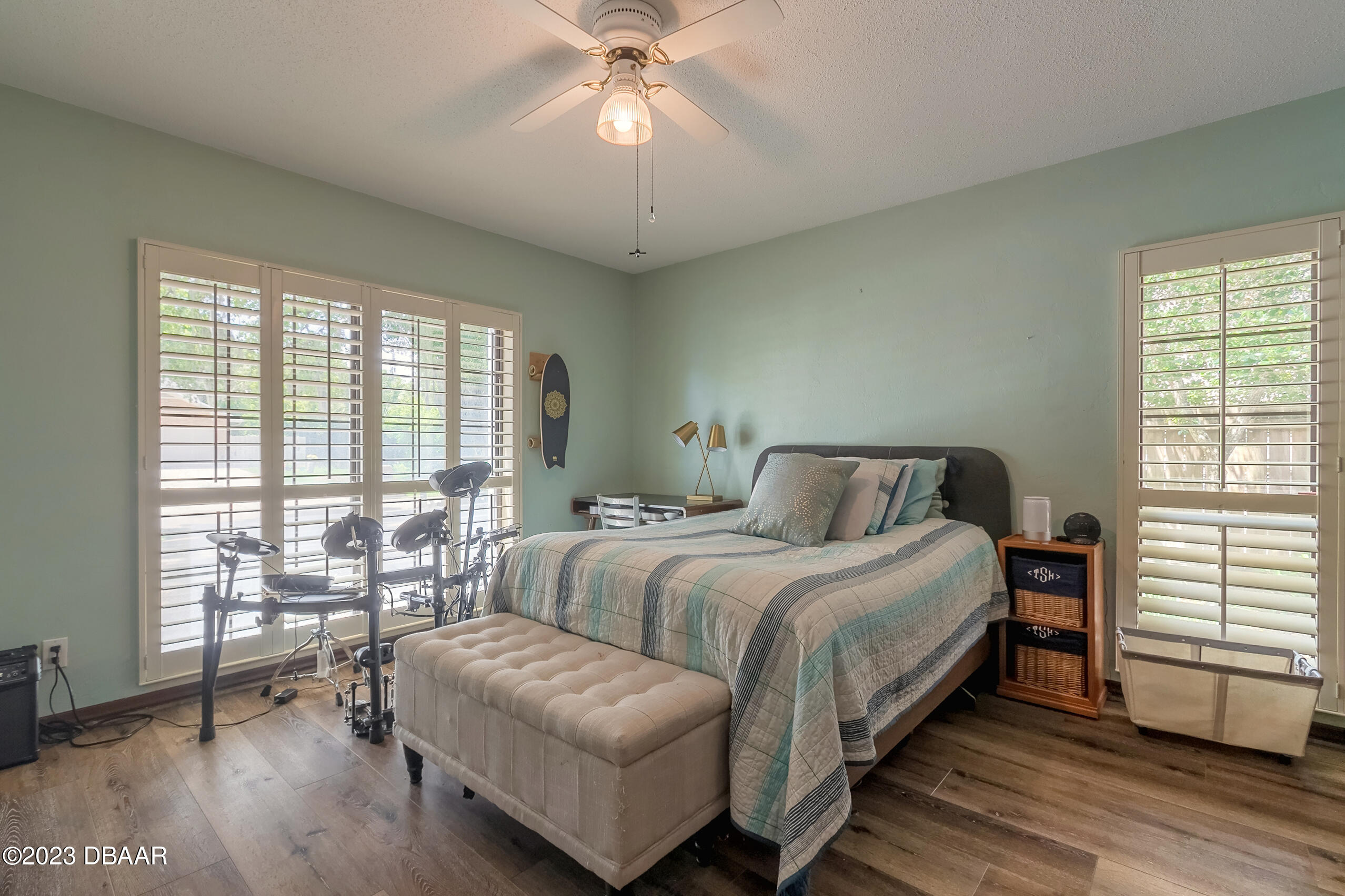 16 Eagle Court Ormond Beach, FL 32174 - Photo 24 of 50 a bedroom with bed and a large window