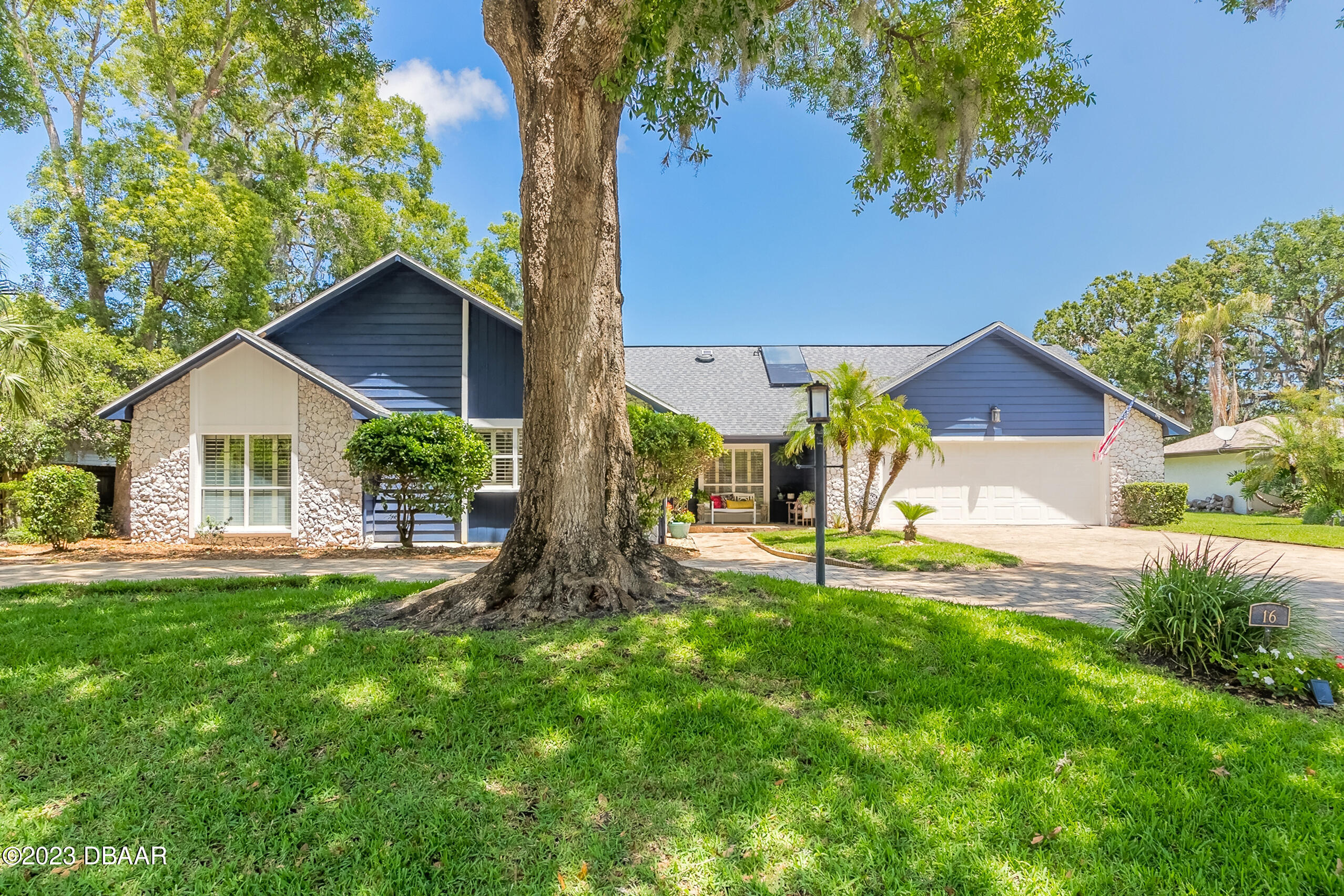 16 Eagle Court Ormond Beach, FL 32174 - Photo 32 of 50 a view of house with a yard