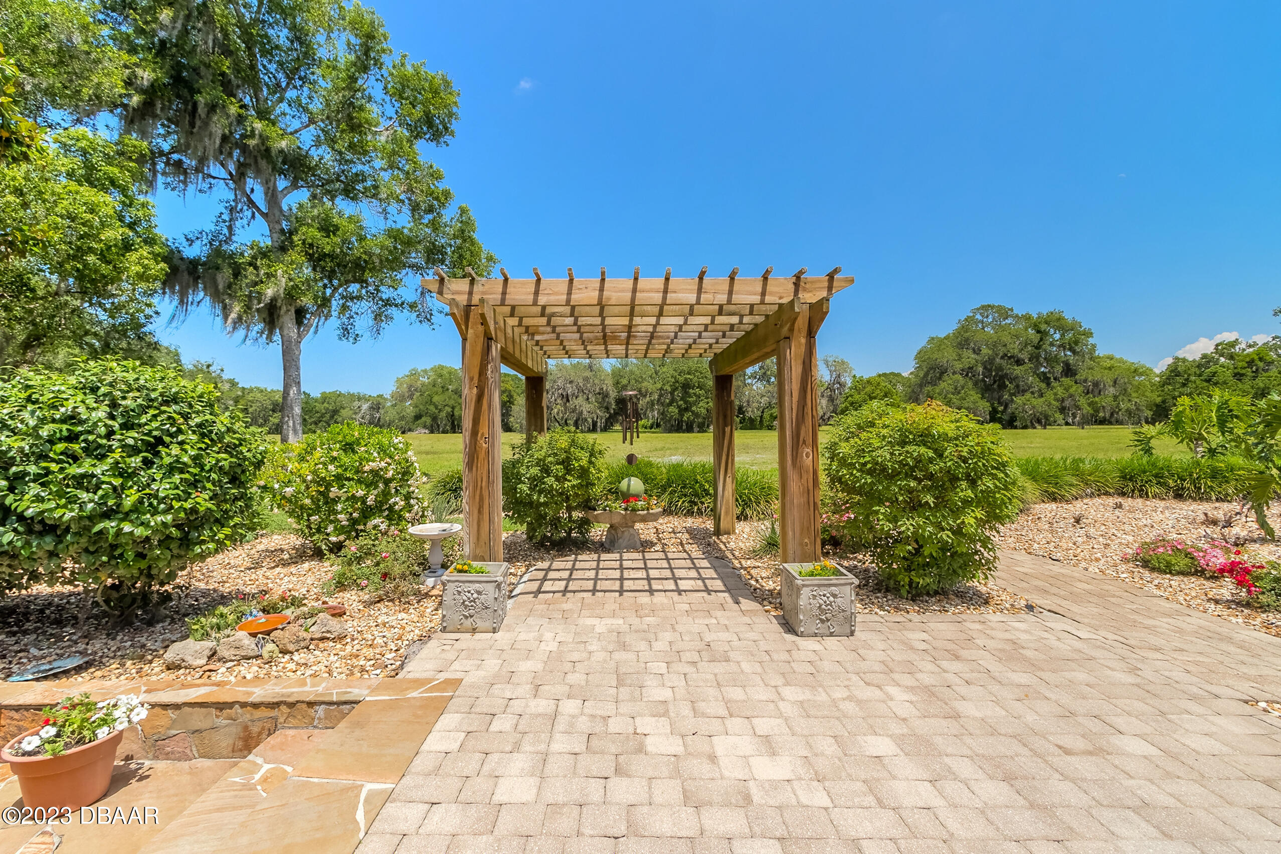 16 Eagle Court Ormond Beach, FL 32174 - Photo 37 of 50 a view of a chairs and table in the patio