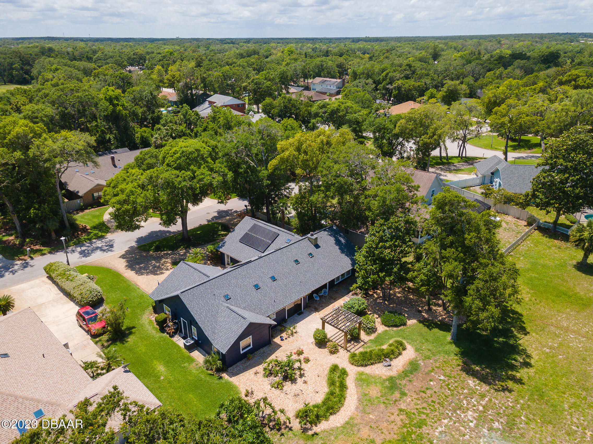 16 Eagle Court Ormond Beach, FL 32174 - Photo 46 of 50 an aerial view of a house with a yard