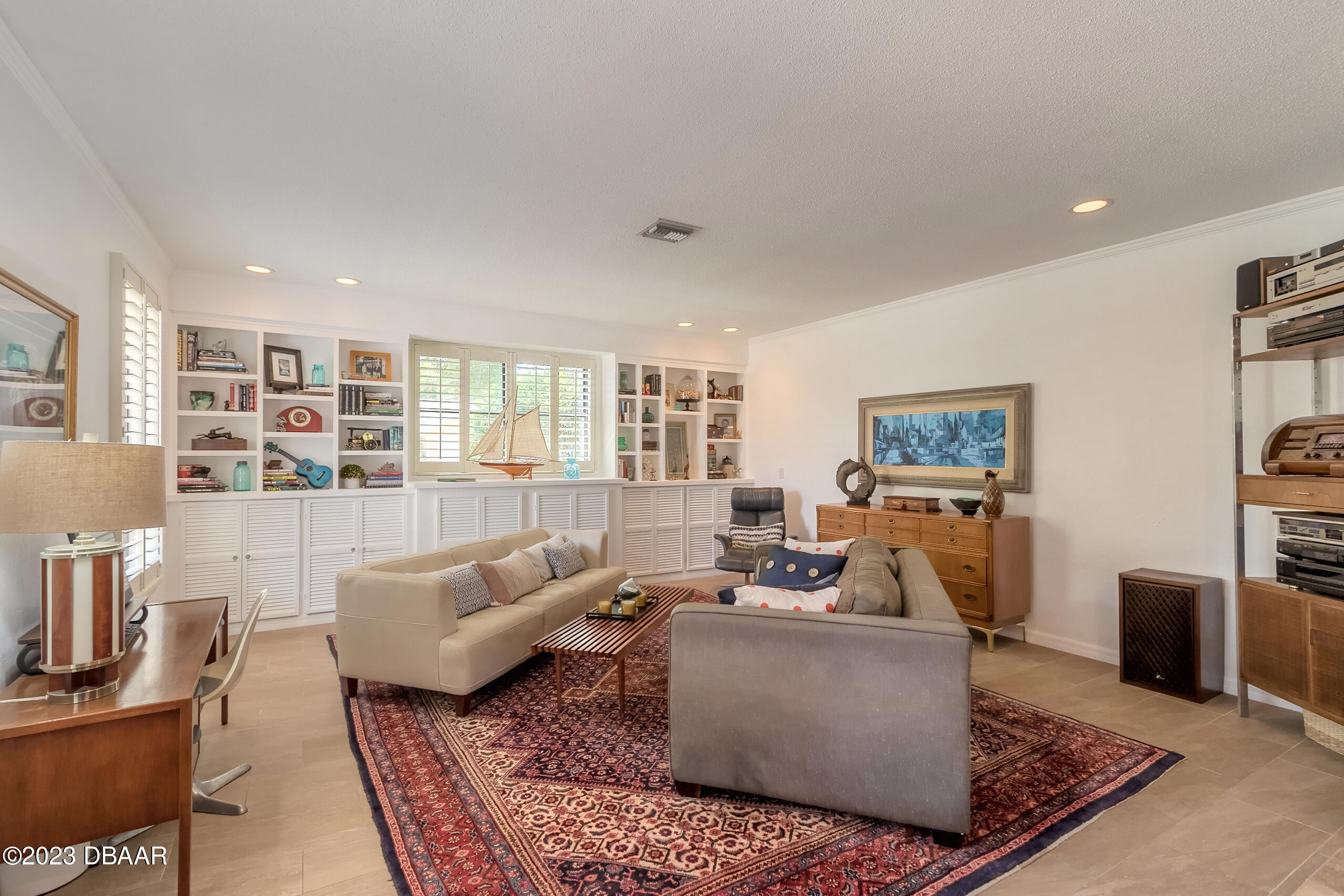 16 Eagle Court Ormond Beach, FL 32174 - Photo 5 of 50 a living room with furniture and a wooden floor