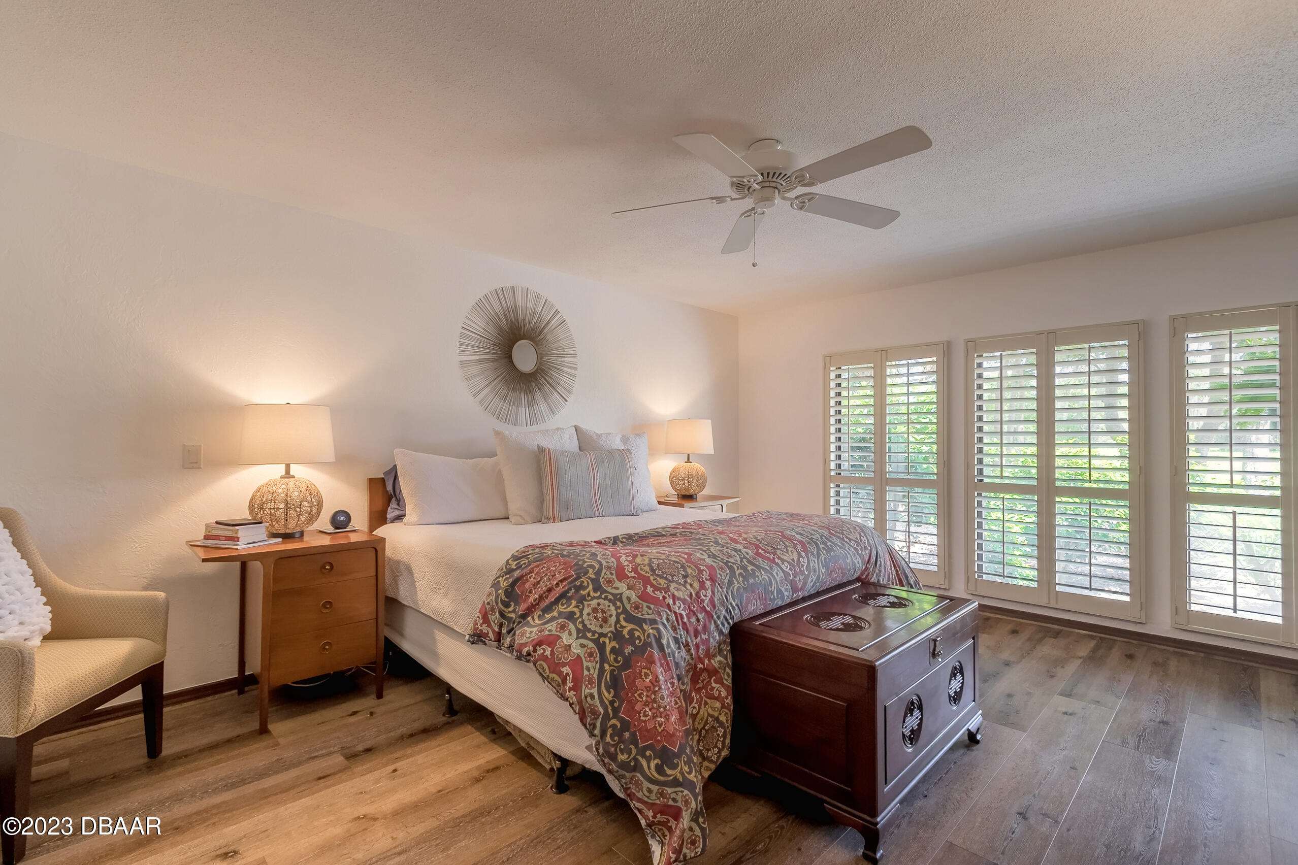 16 Eagle Court Ormond Beach, FL 32174 - Photo 7 of 50 a bedroom with a bed and a large window