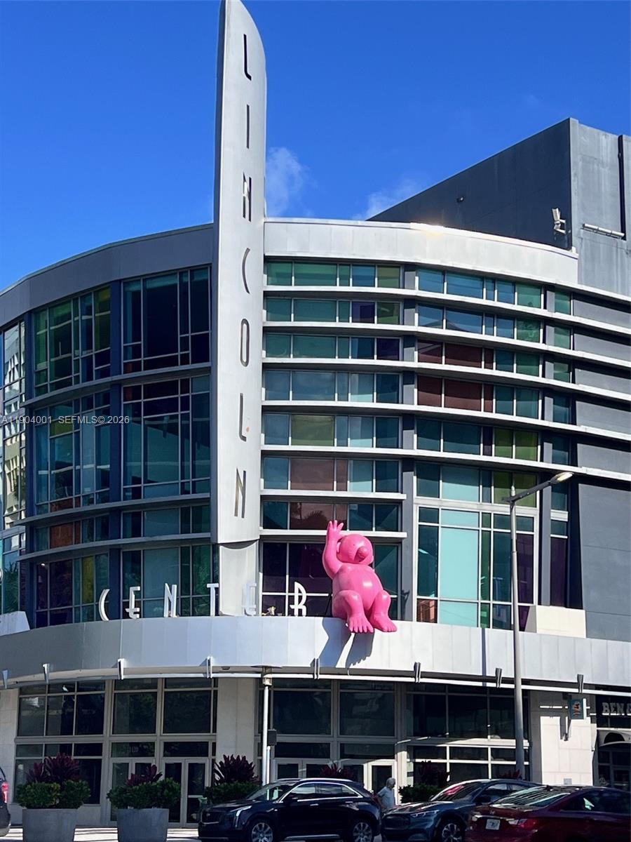 a front view of a building with glass windows