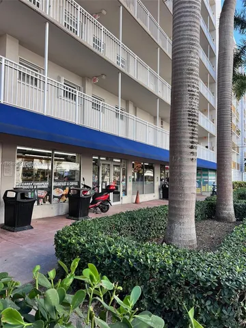 a view of a building with sitting area