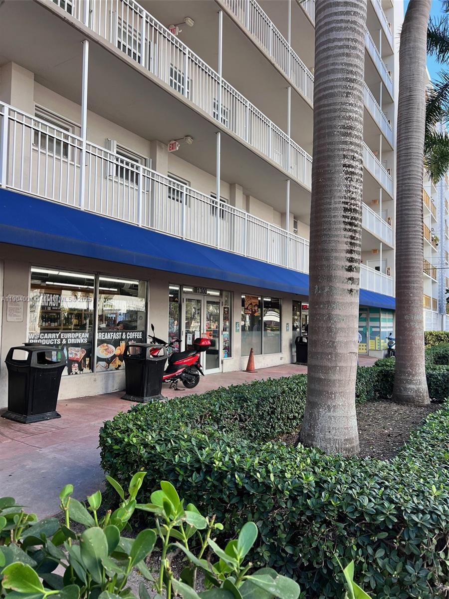 1300 Lincoln Road, Unit D304 Miami Beach, FL 33139 - Photo 3 of 24 a view of a building with sitting area