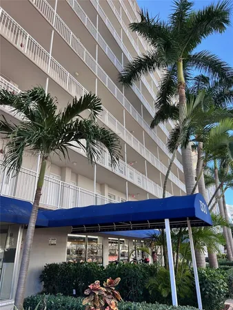 a view of a building and a yard