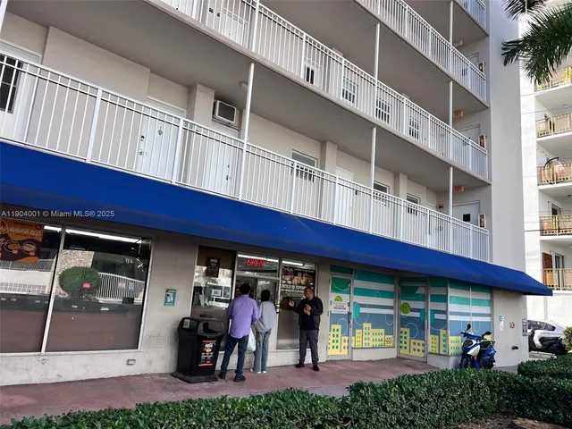 a view of a building with a porch