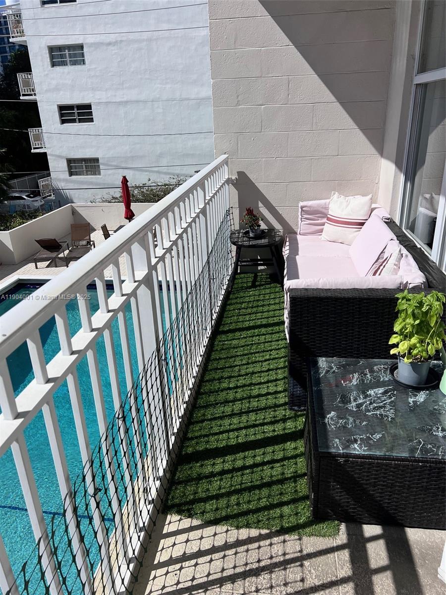 1300 Lincoln Road, Unit D304 Miami Beach, FL 33139 - Photo 7 of 24 a view of a balcony with an outdoor space