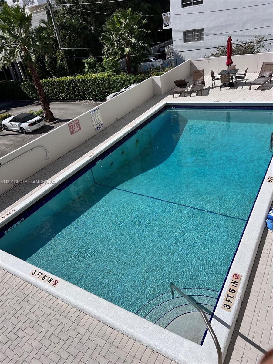 1300 Lincoln Road, Unit D304 Miami Beach, FL 33139 - Photo 8 of 24 a view of a back yard of the house is sitting area