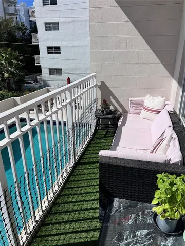 a view of a chairs on the deck