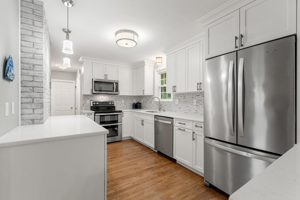 37 Benjamin Road Marlborough, MA 01752 - Photo 15 of 39 a kitchen with stainless steel appliances a refrigerator sink and microwave