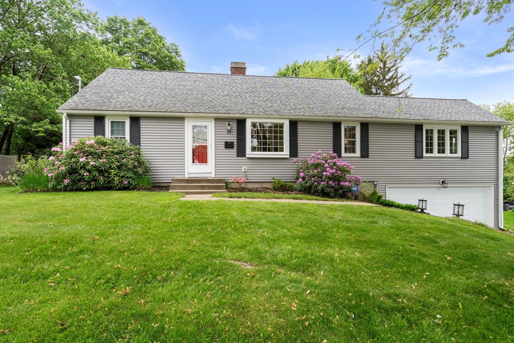 37 Benjamin Road Marlborough, MA 01752 - Photo 2 of 39 a front view of house with yard and green space
