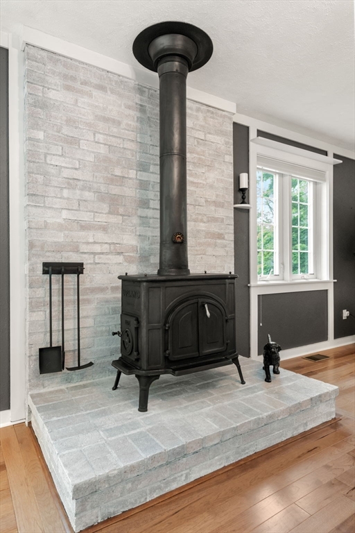 37 Benjamin Road Marlborough, MA 01752 - Photo 21 of 39 a bedroom with a bed and a chandelier