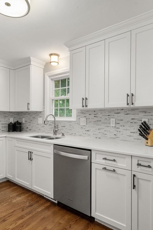37 Benjamin Road Marlborough, MA 01752 - Photo 22 of 39 a kitchen with granite countertop white cabinets and a sink