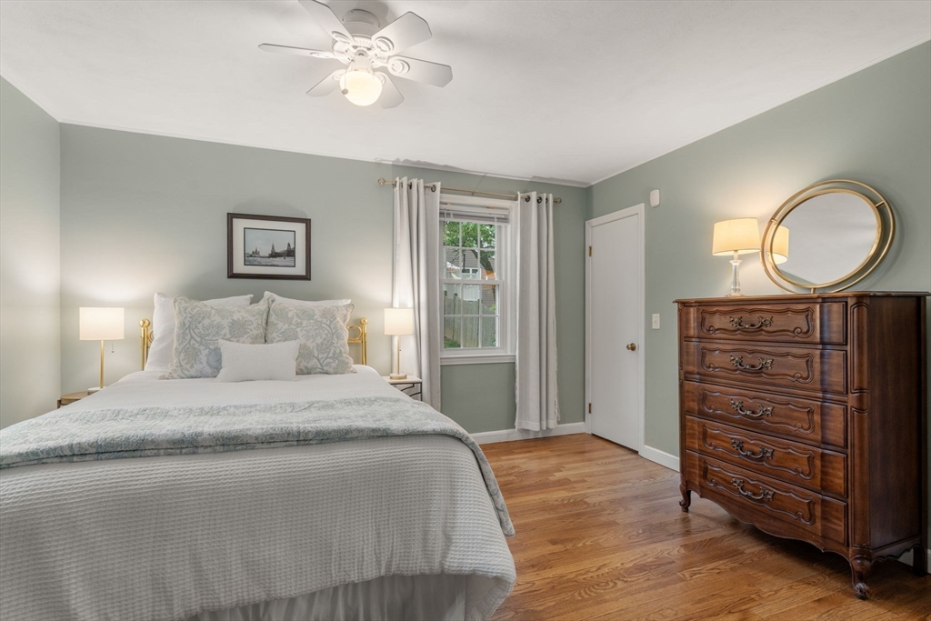 37 Benjamin Road Marlborough, MA 01752 - Photo 26 of 39 a bedroom with a bed and a chandelier
