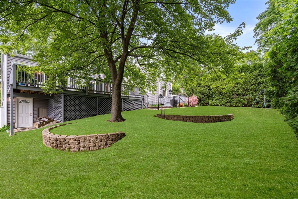 37 Benjamin Road Marlborough, MA 01752 - Photo 37 of 39 a view of a house with a yard