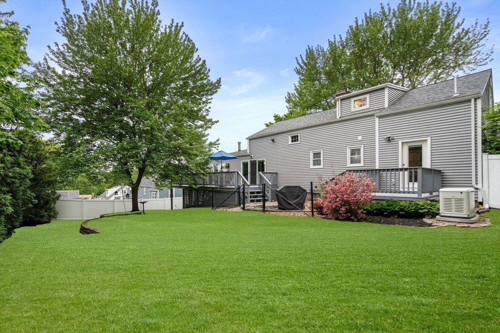 37 Benjamin Road Marlborough, MA 01752 - Photo 38 of 39 a view of a house with a backyard