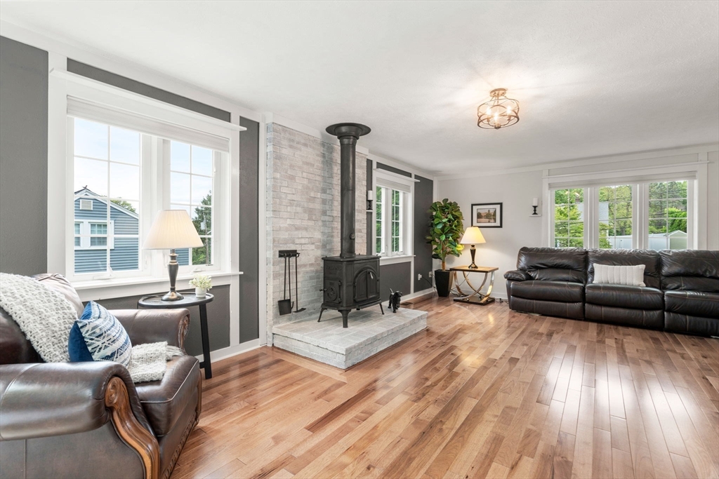 37 Benjamin Road Marlborough, MA 01752 - Photo 6 of 39 a living room with furniture and wooden floor
