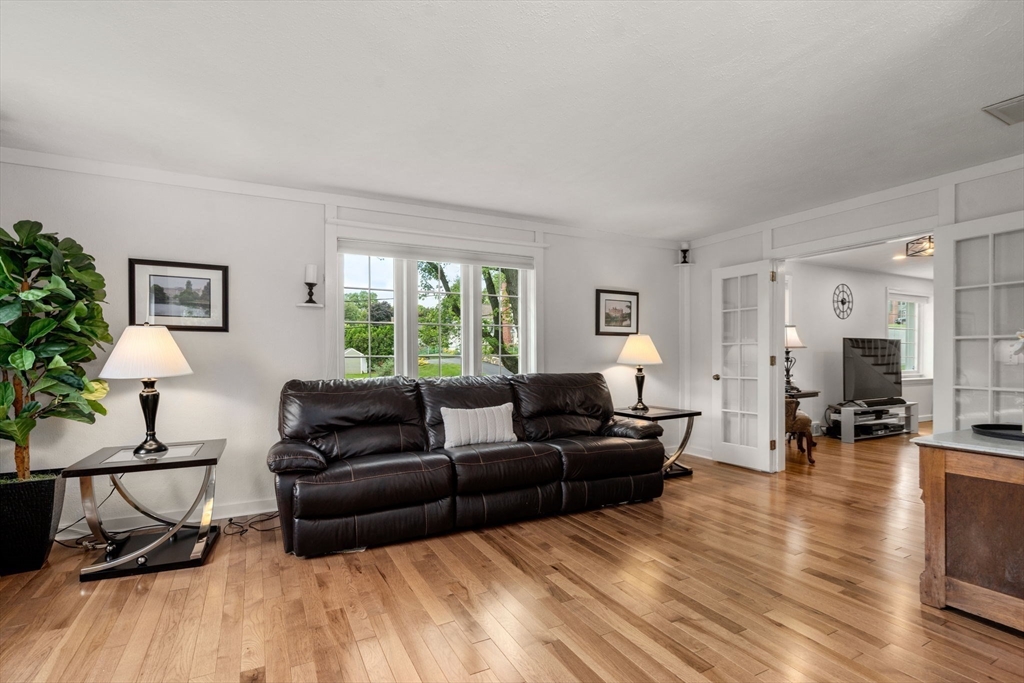 37 Benjamin Road Marlborough, MA 01752 - Photo 8 of 39 a living room with furniture and wooden floor
