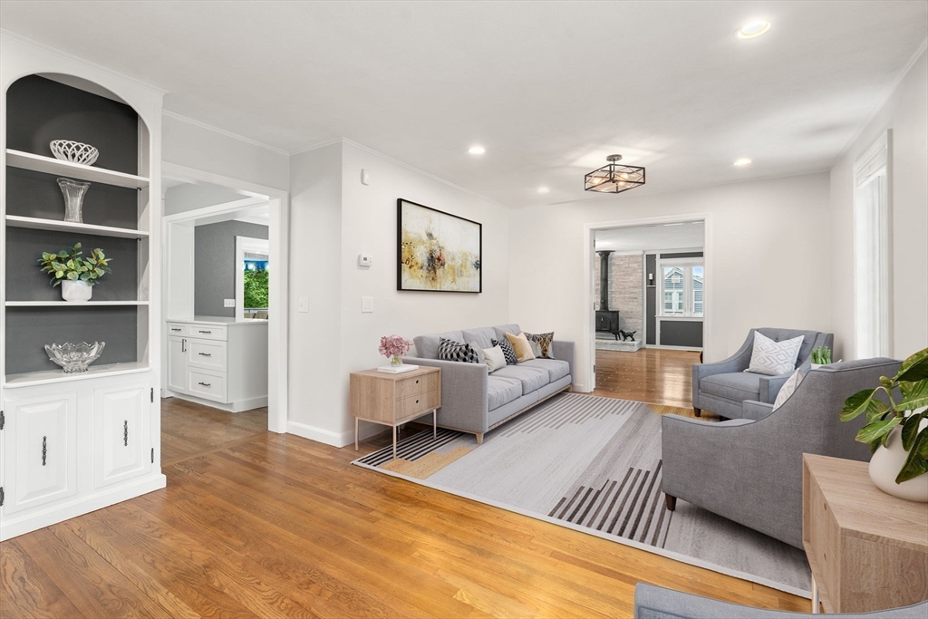 37 Benjamin Road Marlborough, MA 01752 - Photo 10 of 39 a living room with furniture and a wooden floor