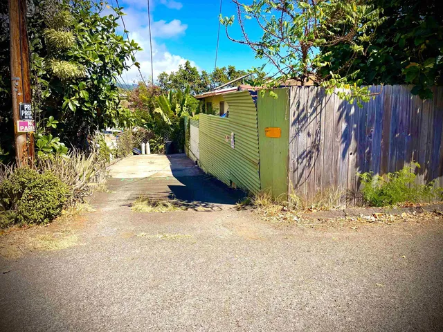 a view of street with sitting area