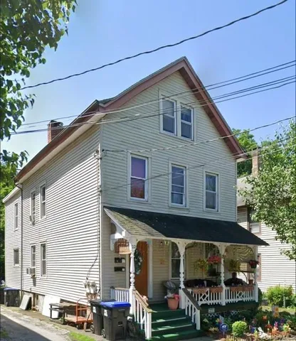 a kitchen with stainless steel appliances a stove and a refrigerator