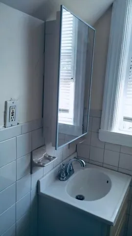 a bathroom with a sink and a bathtub