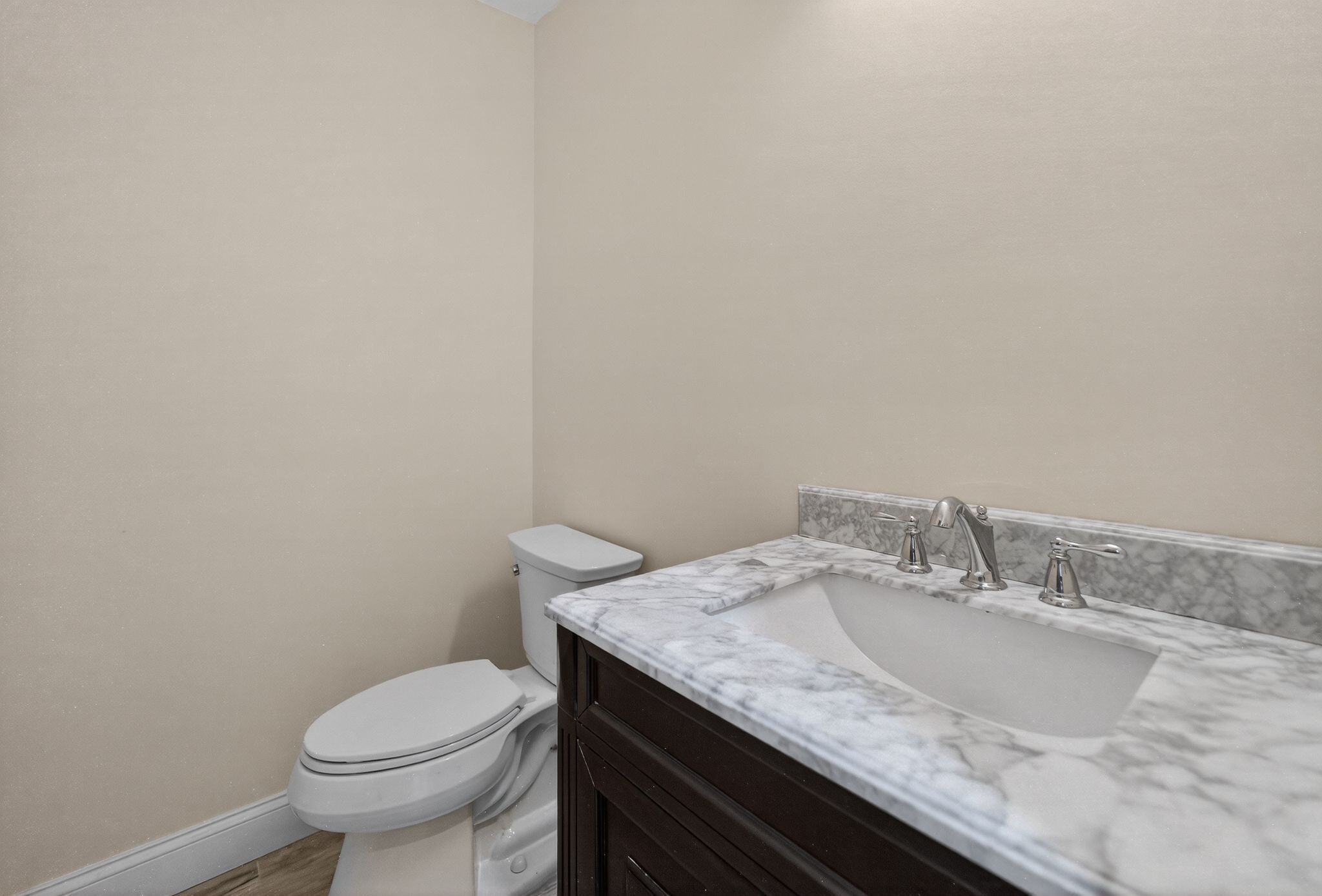 410 3rd Avenue Fayetteville, TN 37334 - Photo 29 of 49 a bathroom with a granite countertop toilet sink and mirror
