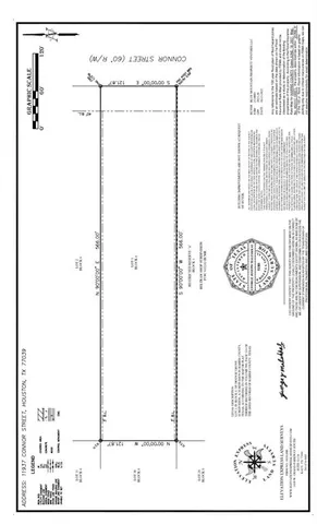 a picture of a bathroom with a shower and a mirror