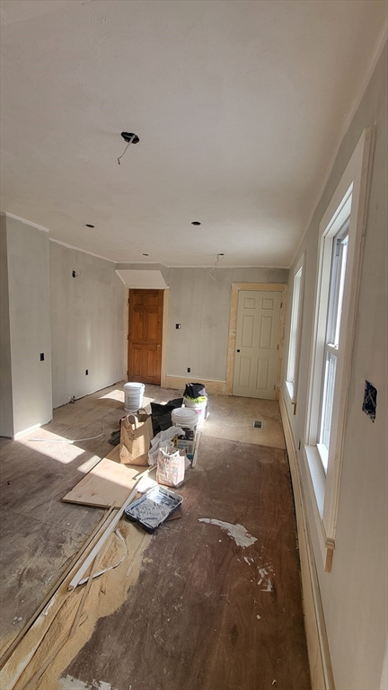 52 Willow Street, Unit 52 Lowell, MA 01852 - Photo 2 of 16 a view of a livingroom with furniture and window