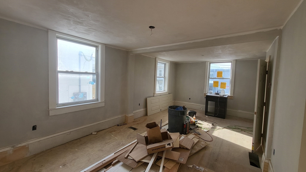 52 Willow Street, Unit 52 Lowell, MA 01852 - Photo 6 of 16 a room with furniture