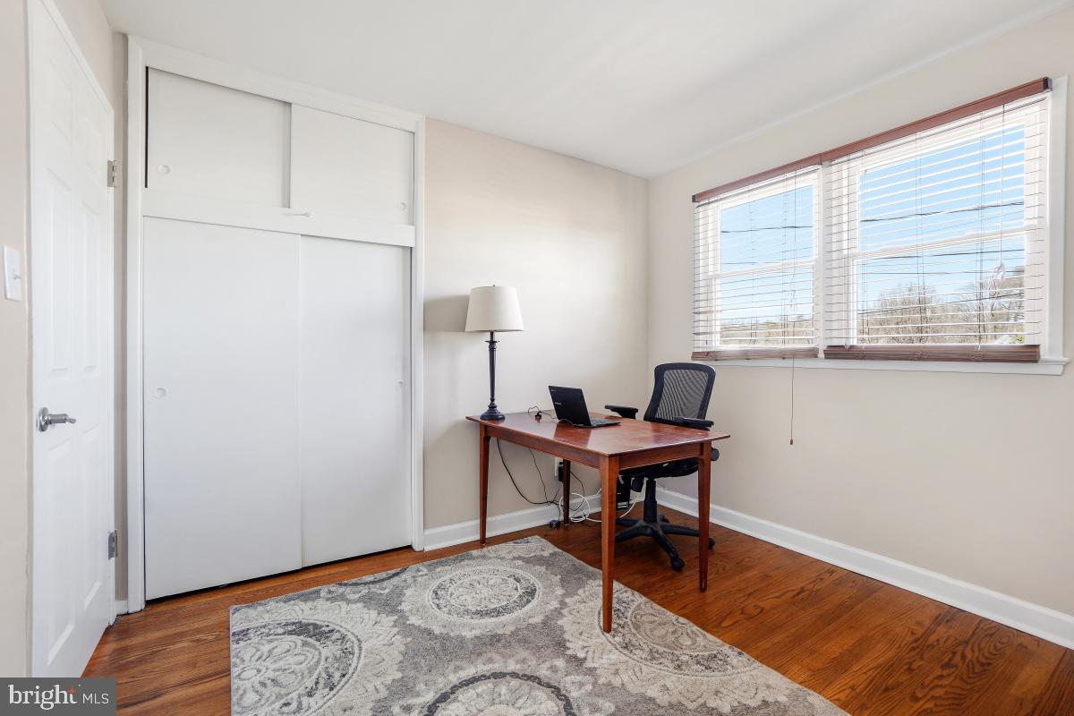 6703 Anders Terrace Springfield, VA 22151 - Photo 18 of 33 a workspace with furniture and wooden floor