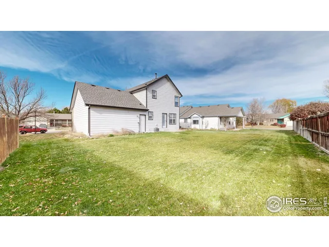 a black and white photo of a big room
