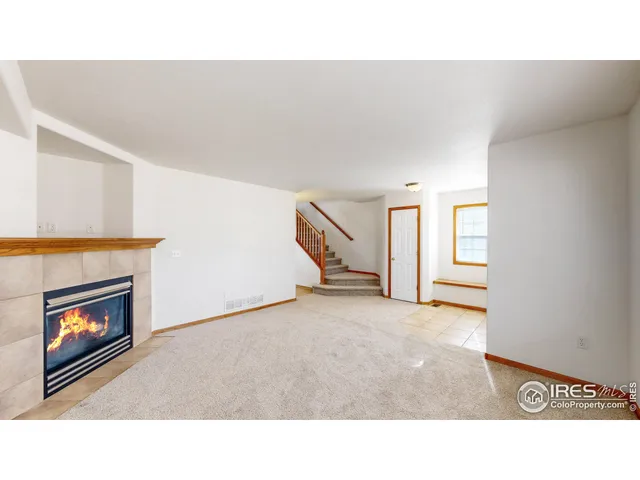 a open living room with a fireplace