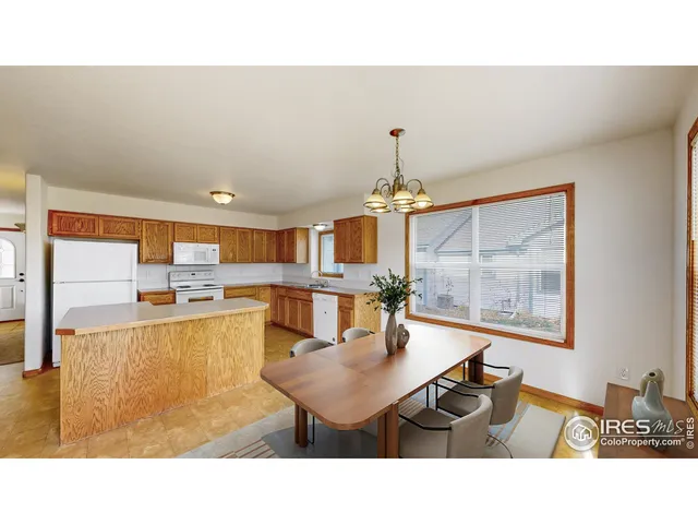 a living room with dining table
