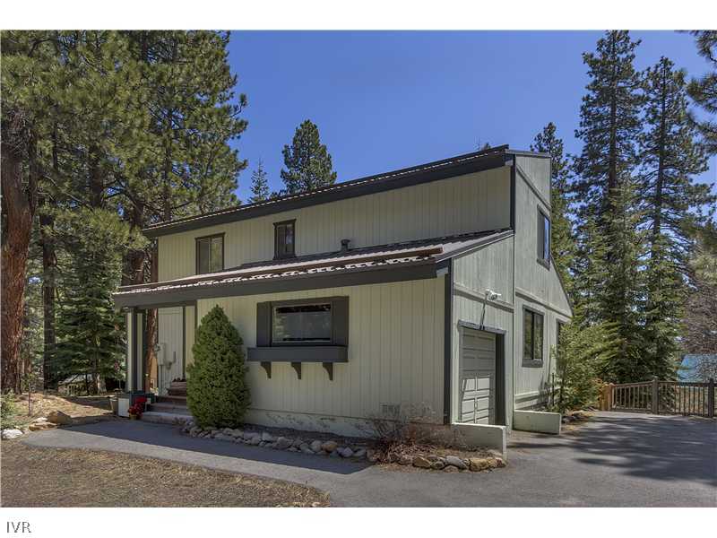 861 Jeffrey Street Incline Village, NV 89451 - Photo 1 of 13 a front view of a house with garden