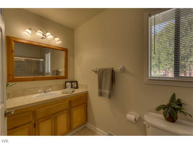 861 Jeffrey Street Incline Village, NV 89451 - Photo 10 of 13 a bathroom with a sink and a mirror
