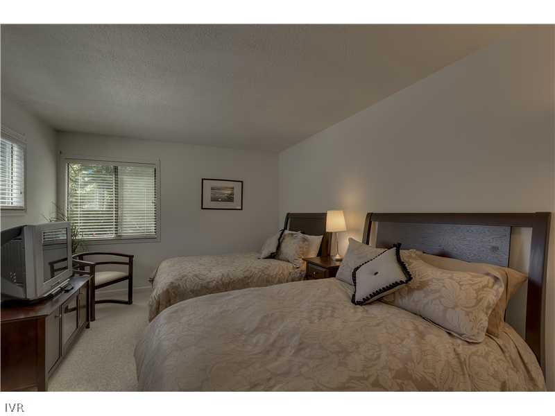 861 Jeffrey Street Incline Village, NV 89451 - Photo 11 of 13 a bedroom with a bed chair and a window